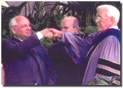 Pastor Schuller and Mikhail Gorbachev share a Masonic handshake