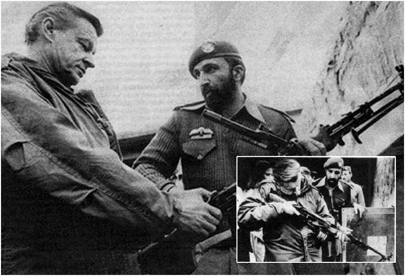 Zbigniew Brezinski inspects a firearm with Osama bin Laden around 1979 when he was U.S. Secretary of State
