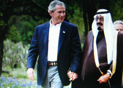 Bush holds hands with a Saudi Prince