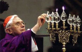 Antipope Benedict XVI symbolically torches the Seven Sacraments